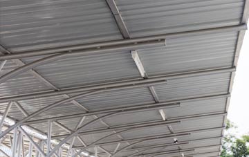 installing Post Green metal roofing